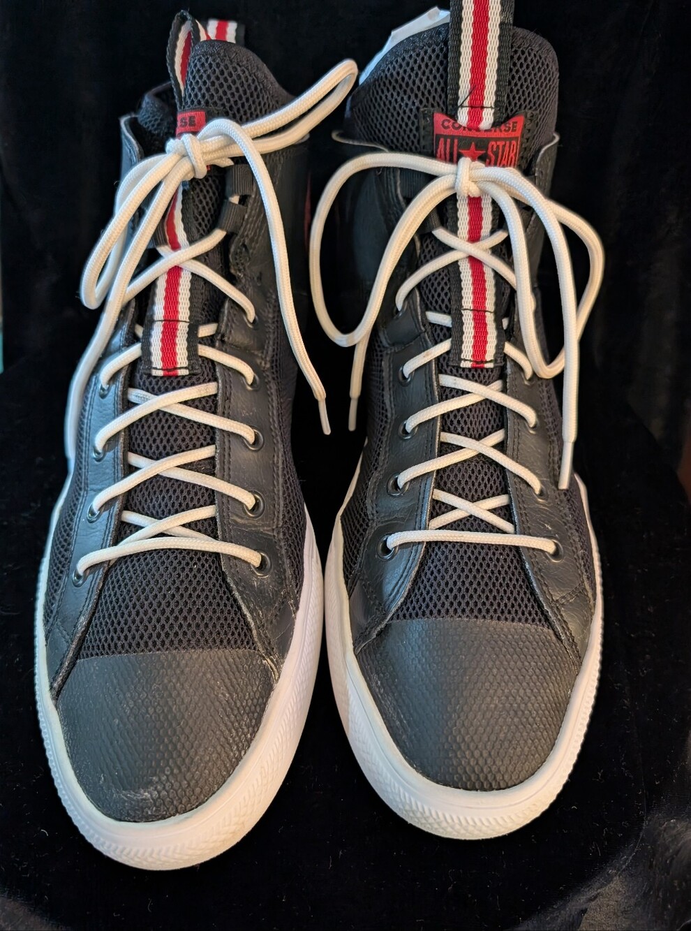 Converse Men’s Black High-Top Sneakers with White Laces and Red Stripe